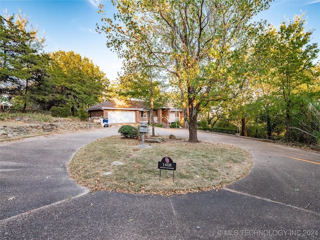 view of front of property with a garage