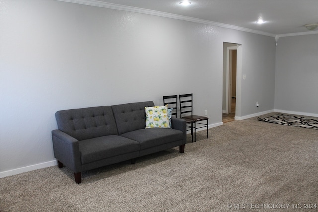 carpeted living room with ornamental molding