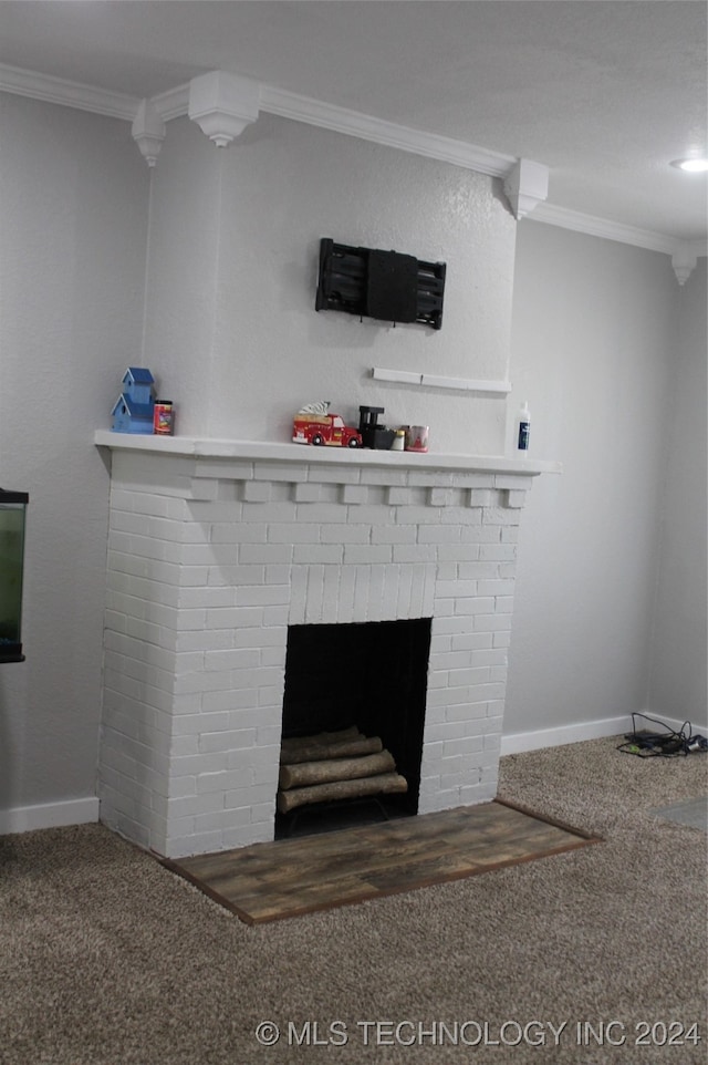 interior details featuring ornamental molding, carpet floors, and a brick fireplace