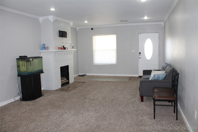 carpeted living room featuring crown molding and a fireplace