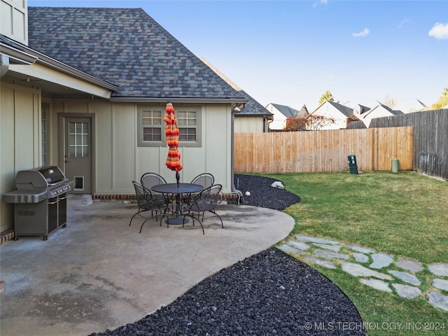 view of patio with a grill