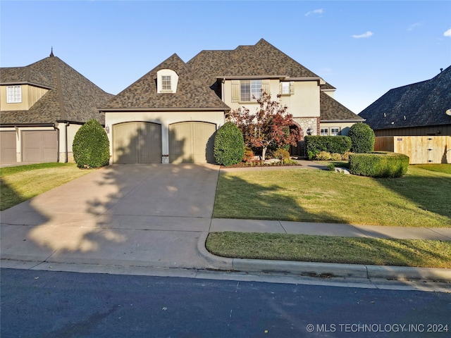 view of front of home with a front lawn