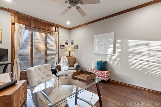 living area featuring crown molding, dark wood-type flooring, and ceiling fan