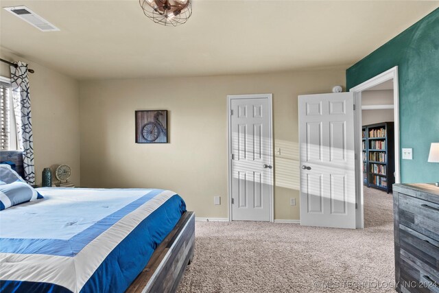 bedroom featuring carpet flooring