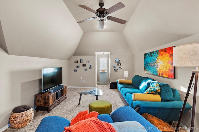 living room featuring vaulted ceiling, light colored carpet, and ceiling fan