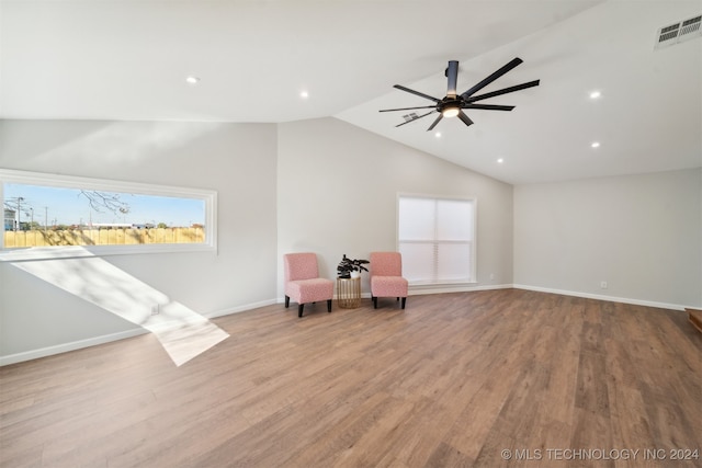 unfurnished room featuring lofted ceiling, light hardwood / wood-style flooring, and ceiling fan