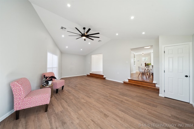 sitting room featuring ceiling fan, vaulted ceiling, and hardwood / wood-style floors