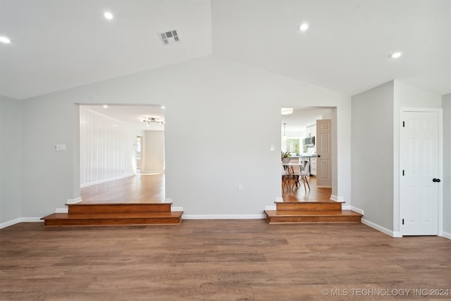 interior space featuring vaulted ceiling and hardwood / wood-style floors