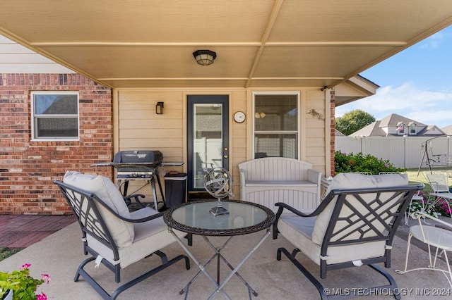 view of patio / terrace featuring a grill and an outdoor hangout area