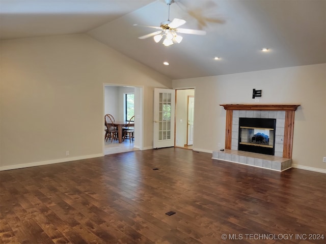 unfurnished living room with a fireplace, dark hardwood / wood-style floors, high vaulted ceiling, and ceiling fan