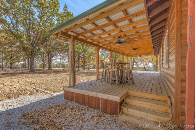 wooden deck with ceiling fan