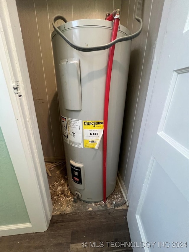 utility room with electric water heater