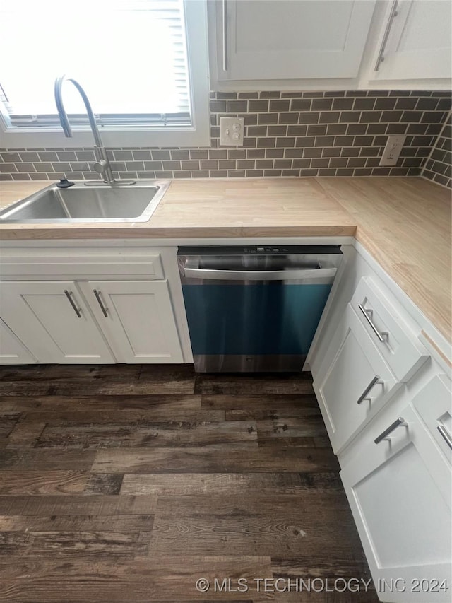 kitchen featuring white cabinetry, sink, tasteful backsplash, and dishwasher