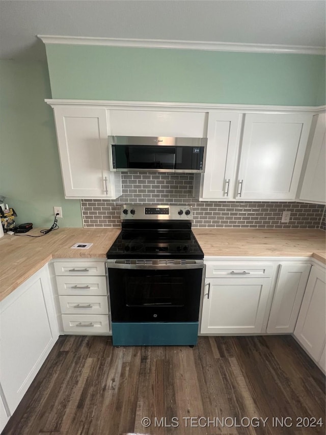 kitchen with white cabinetry, dark wood-type flooring, and appliances with stainless steel finishes