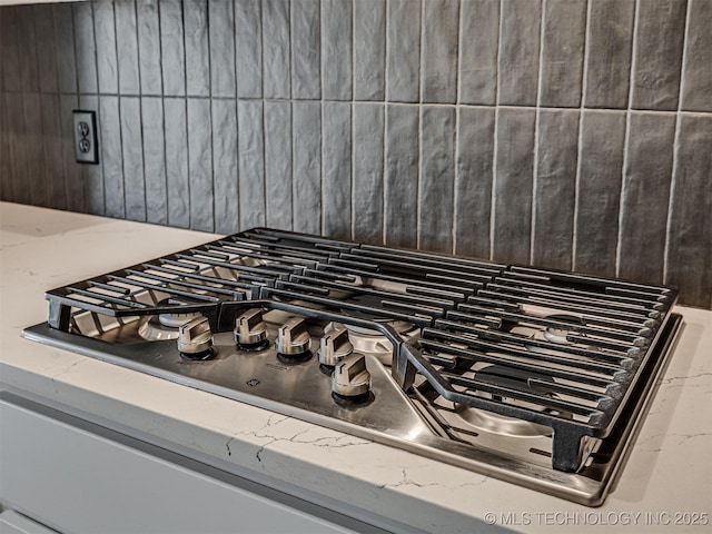 room details with stainless steel gas stovetop