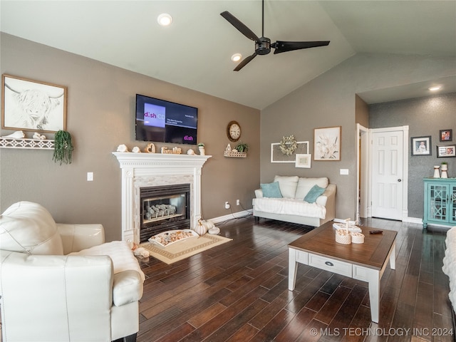 living room with vaulted ceiling, dark hardwood / wood-style floors, and ceiling fan