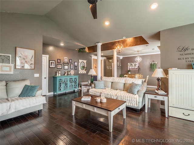 living room with crown molding, dark wood-type flooring, ceiling fan with notable chandelier, and vaulted ceiling