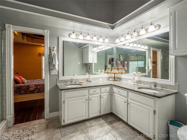 bathroom with vanity and wood-type flooring