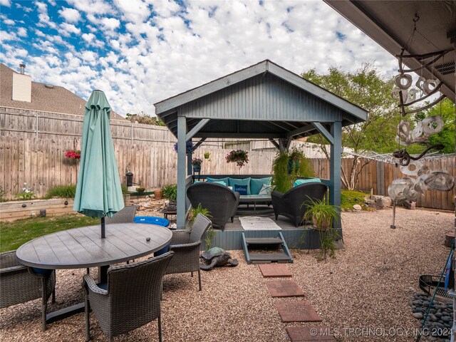 view of patio / terrace with a gazebo and an outdoor living space