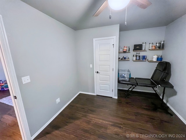 office area featuring dark hardwood / wood-style floors and ceiling fan