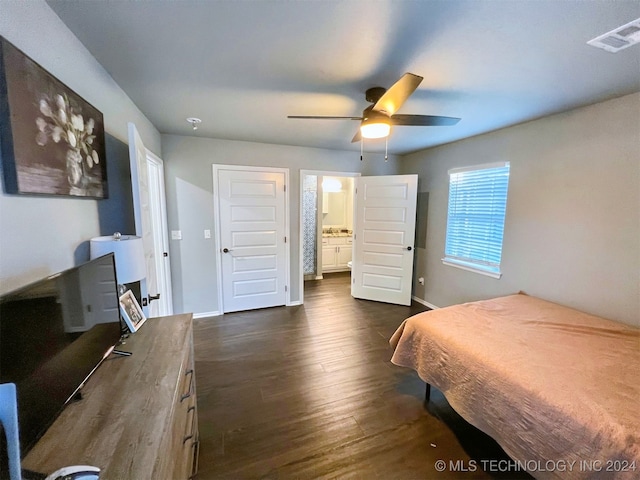 bedroom with dark wood-type flooring and ceiling fan