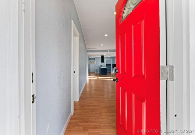 hall featuring wood-type flooring