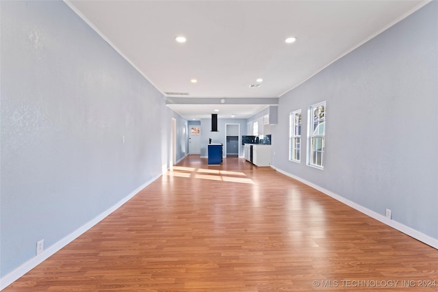 unfurnished living room featuring light hardwood / wood-style floors