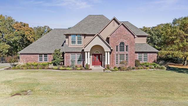 view of front of home with a front yard