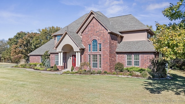 view of front of home with a front lawn