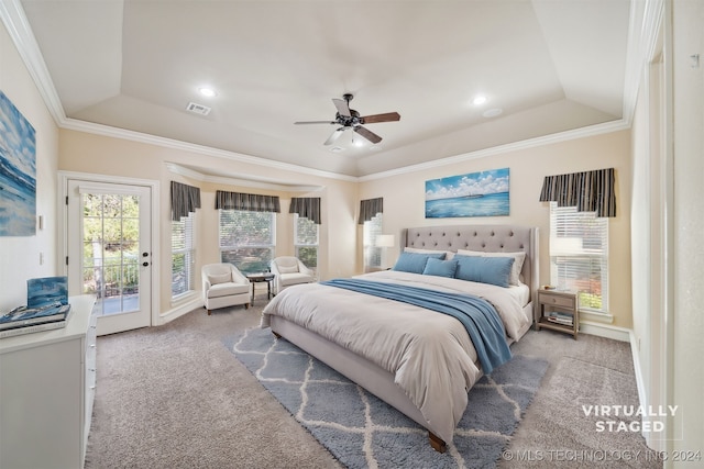 carpeted bedroom featuring access to exterior, ornamental molding, a raised ceiling, and ceiling fan