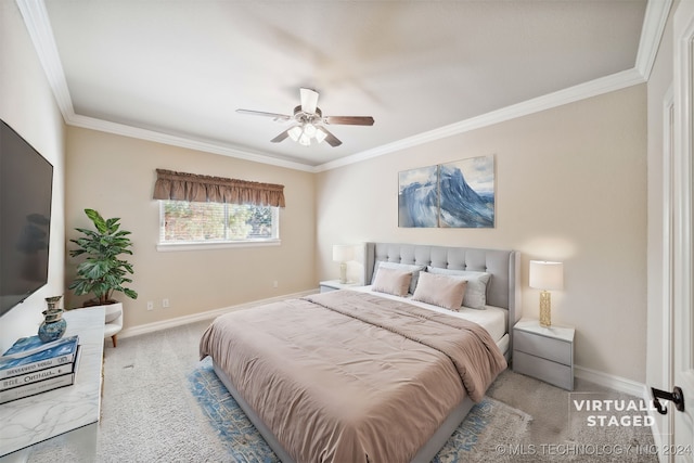 carpeted bedroom with crown molding and ceiling fan