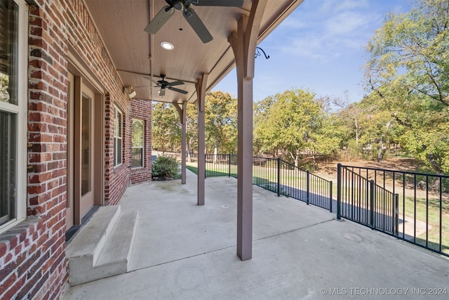 view of patio / terrace featuring ceiling fan