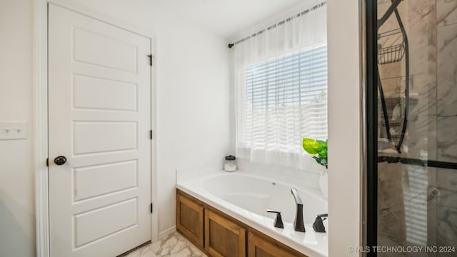 bathroom with independent shower and bath