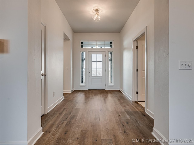 foyer featuring dark hardwood / wood-style floors