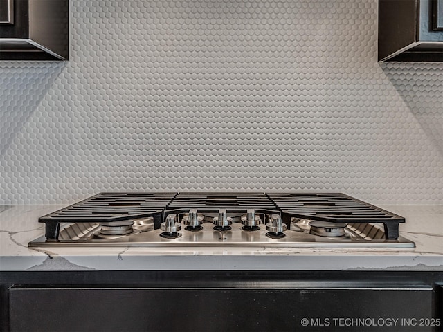 interior details featuring stainless steel gas stovetop