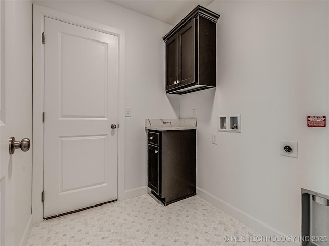 clothes washing area with hookup for an electric dryer, cabinets, and hookup for a washing machine