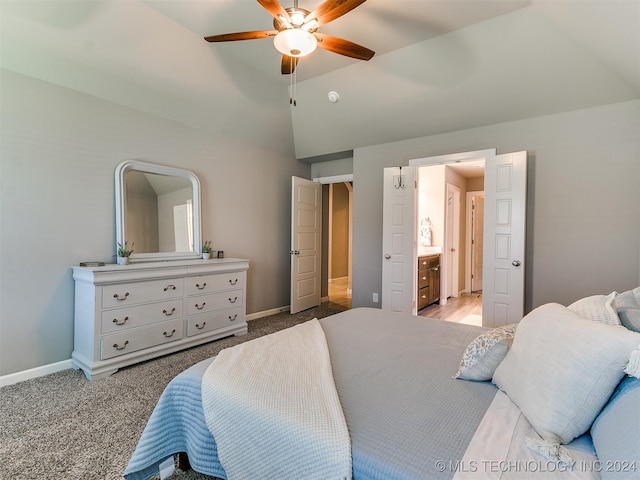 bedroom featuring ceiling fan, light carpet, and lofted ceiling