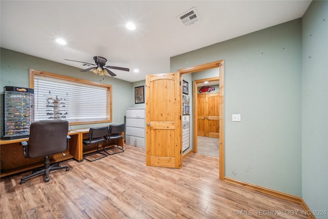 office area featuring light hardwood / wood-style floors and ceiling fan