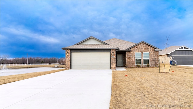 ranch-style home with a garage