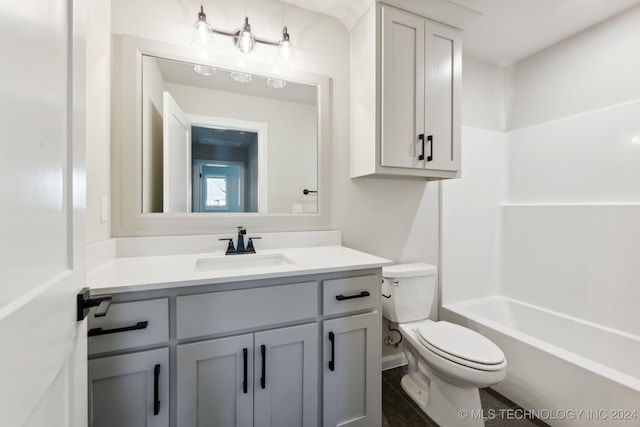 full bathroom featuring vanity, shower / bathing tub combination, and toilet