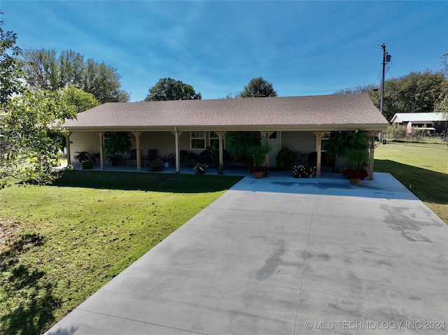 ranch-style home featuring a front lawn