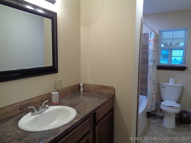 full bathroom with vanity, toilet, shower / bathtub combination with curtain, and tile patterned flooring