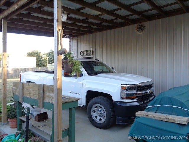 view of car parking featuring a carport