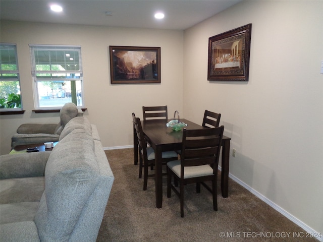 view of carpeted dining space