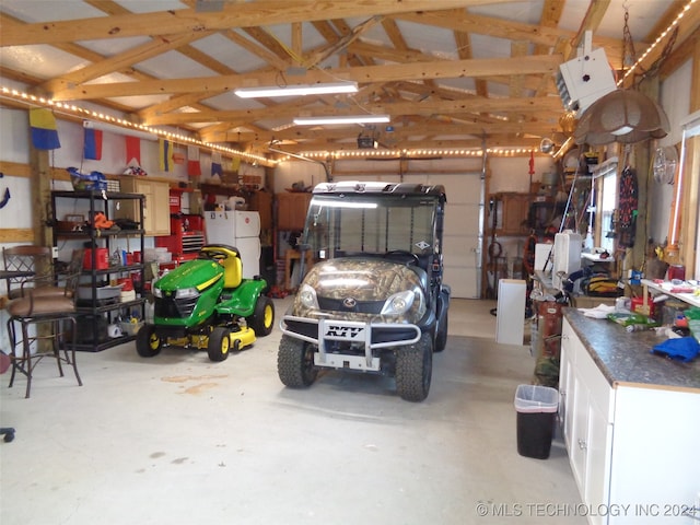 garage with white fridge