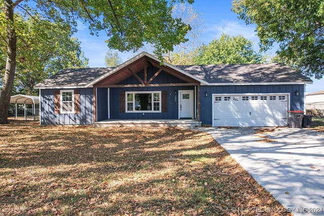 ranch-style house with a garage and a carport