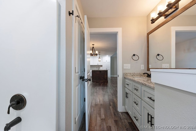 bathroom featuring vanity and hardwood / wood-style floors