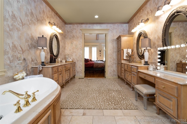 bathroom with vanity, ornamental molding, and a washtub