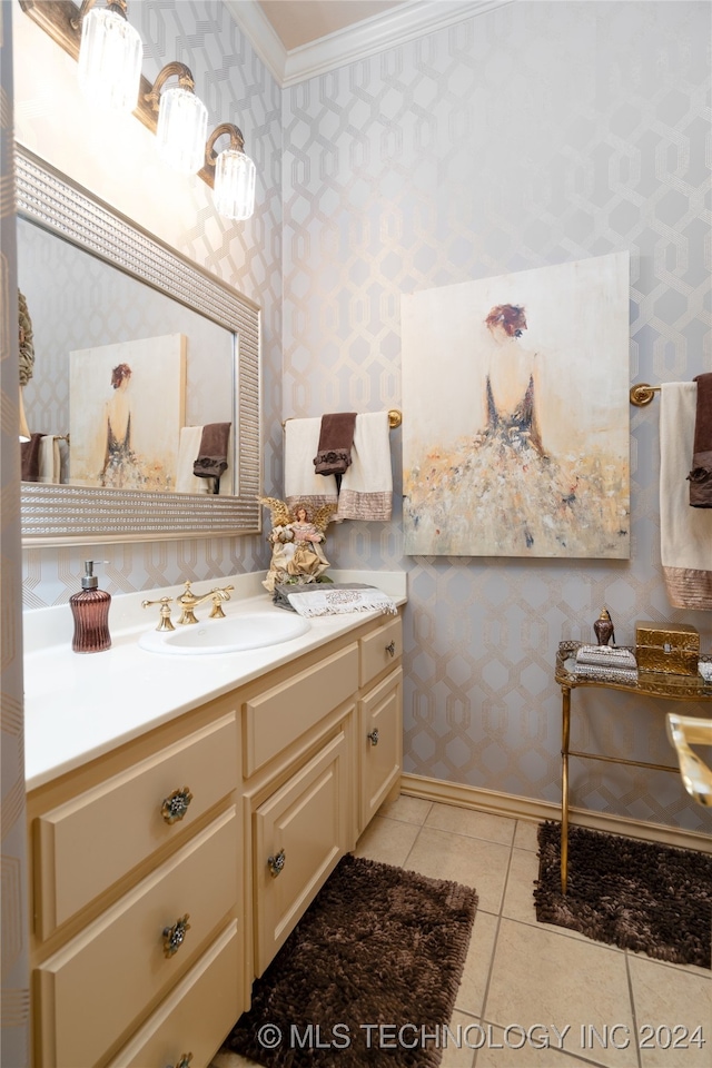 bathroom featuring vanity, ornamental molding, and tile patterned flooring