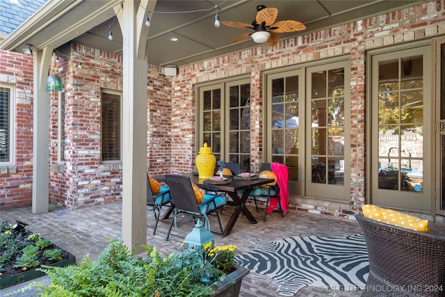 view of patio / terrace featuring ceiling fan